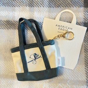 American Eagle Outfitters Snoopy Bag Charm in Green and Cream